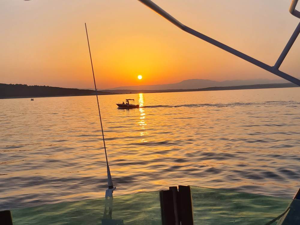 View of sunset from Seafari boat located in adriatic sea